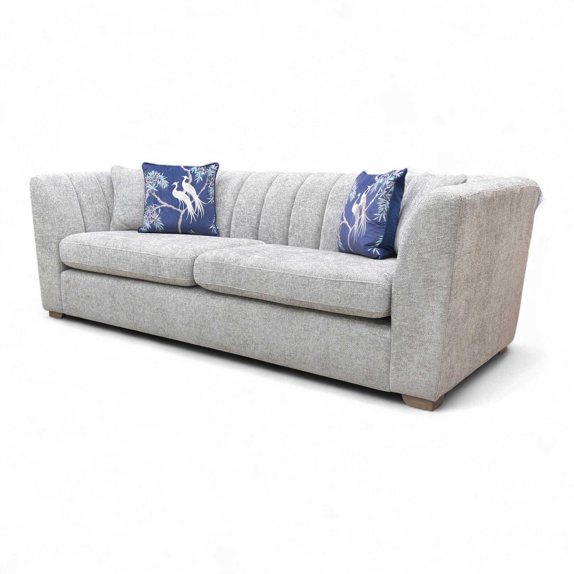 Detail shot of the Removable Arms feature on the Silver Chenille 'Downtown' sofa for easy moving.
