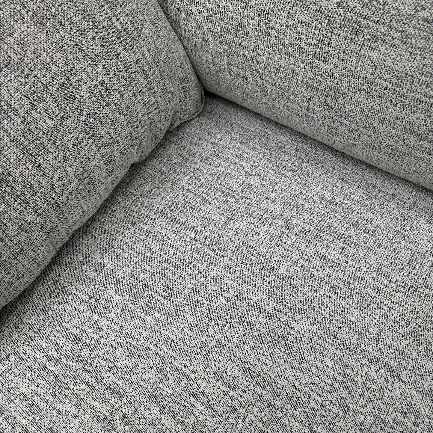 Close-up of the fabric texture and cushion detail.