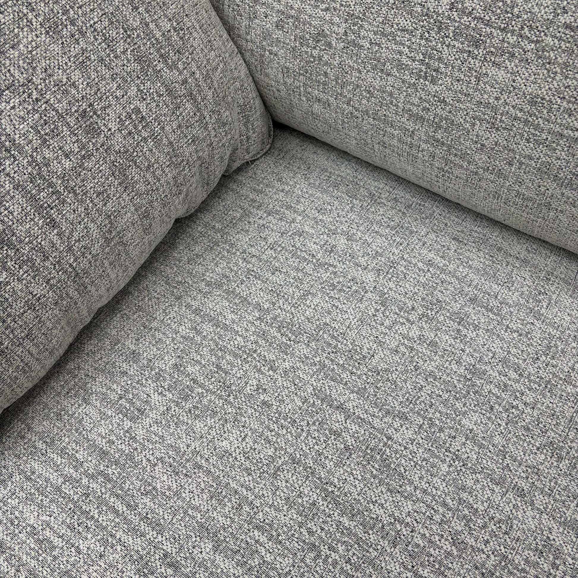 Close-up of the fabric texture and cushion detail.