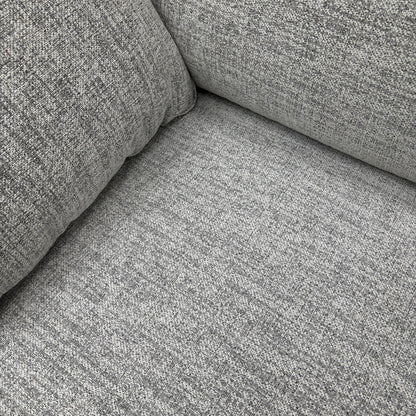 Close-up of the fabric texture and cushion detail.