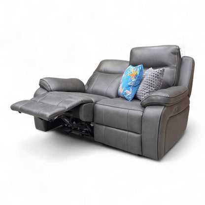 Sofa with the footrest partially extended.