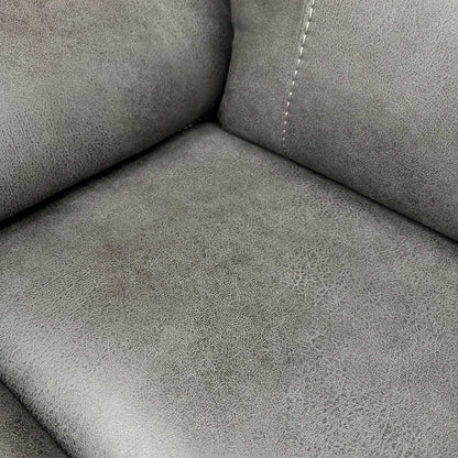 Close-up of the fabric, stitching, and cushion detail.