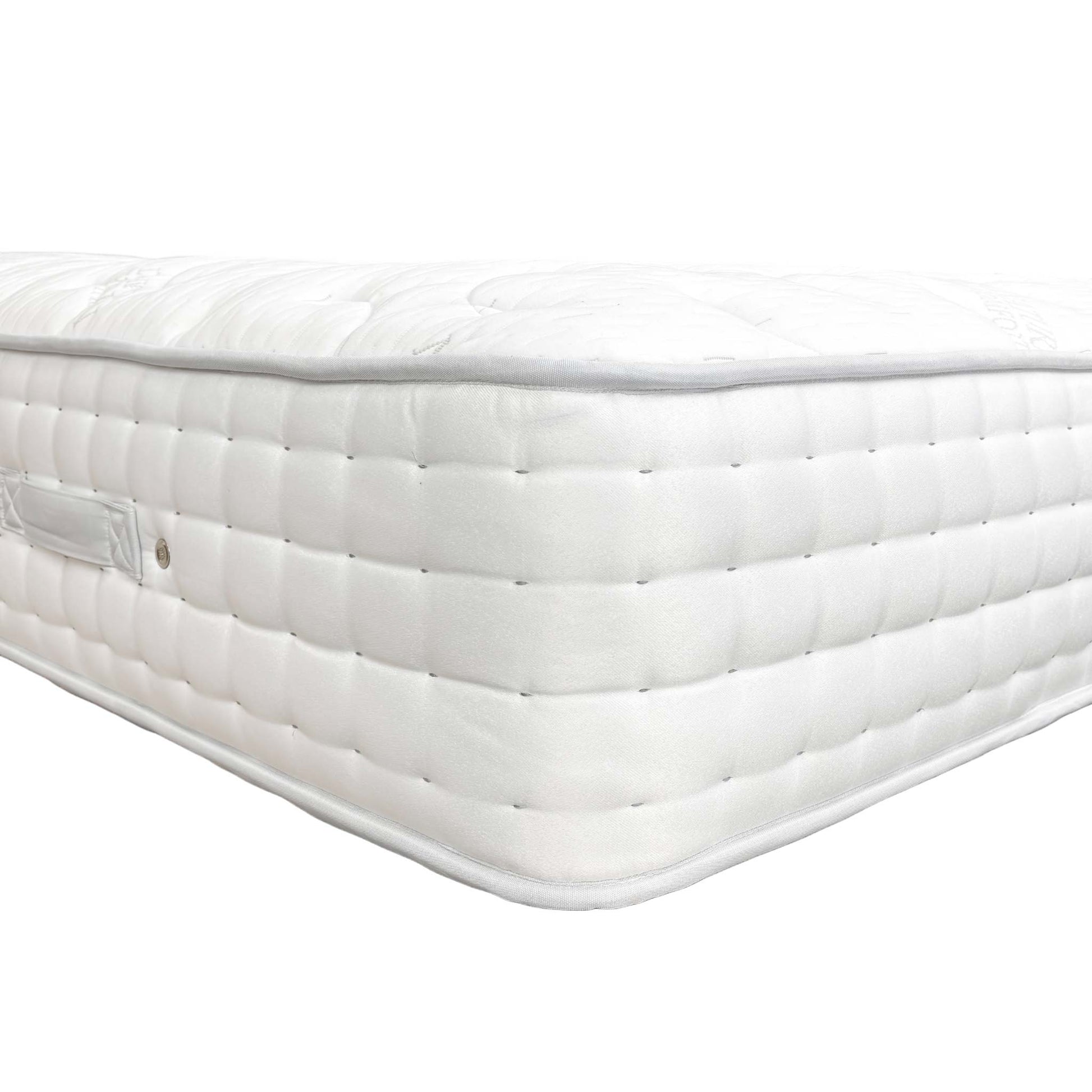 Detail shot of the breathable fabric cover and hypoallergenic properties of the Highgrove Raglan 3000 King Mattress.