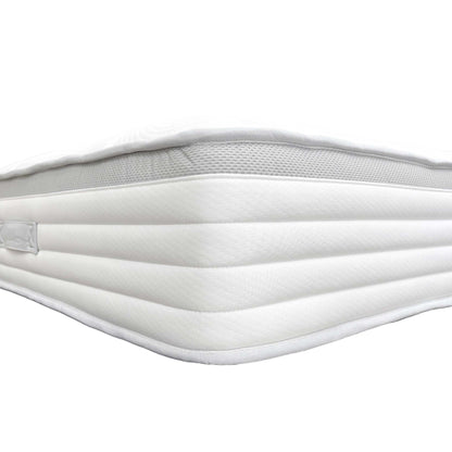 Detail shot of the breathable fabric cover and solid white color of the Medius 1500 Pocket Sprung King Mattress.