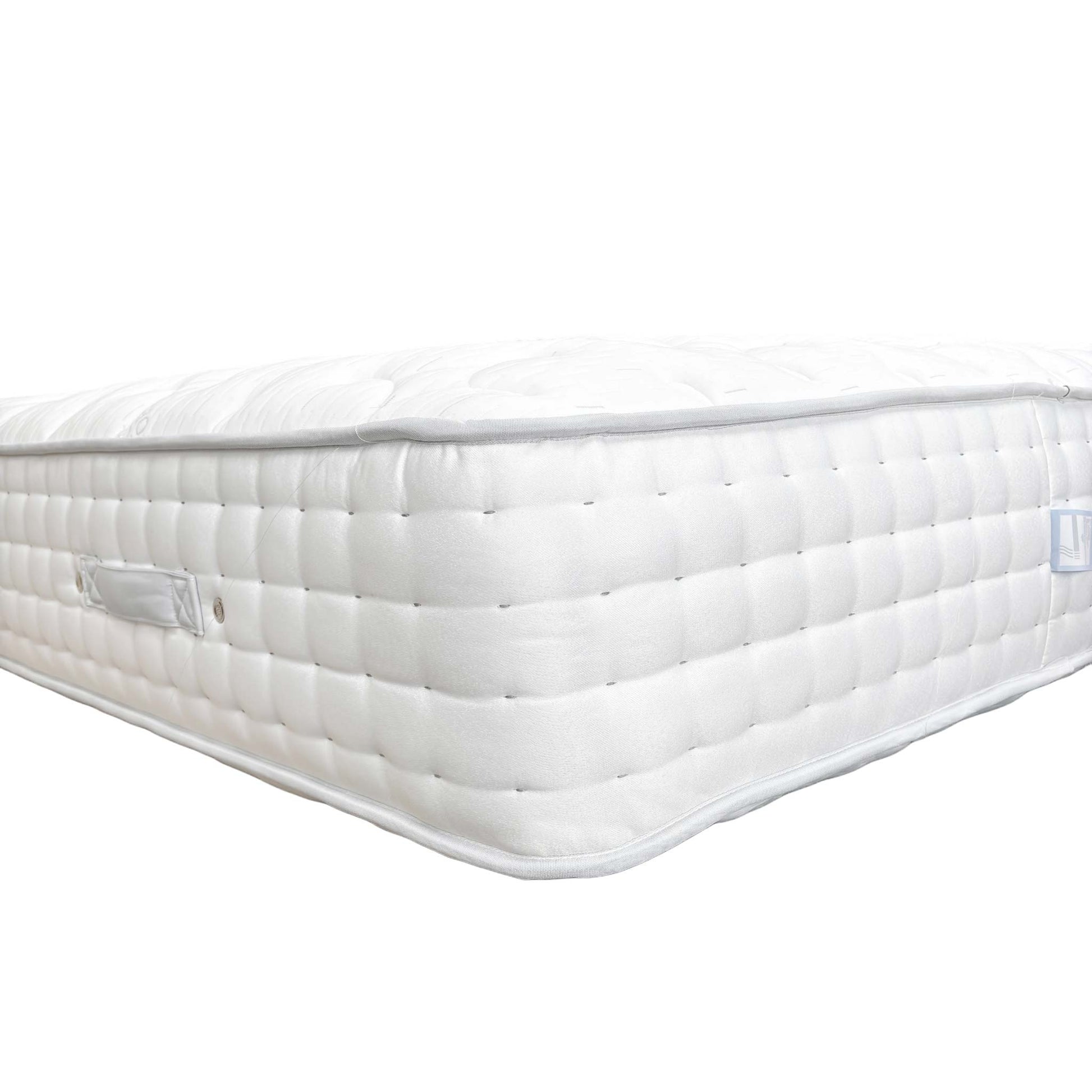 Detail shot of the breathable fabric cover and hypoallergenic properties of the Highgrove Raglan 3000 Mattress.