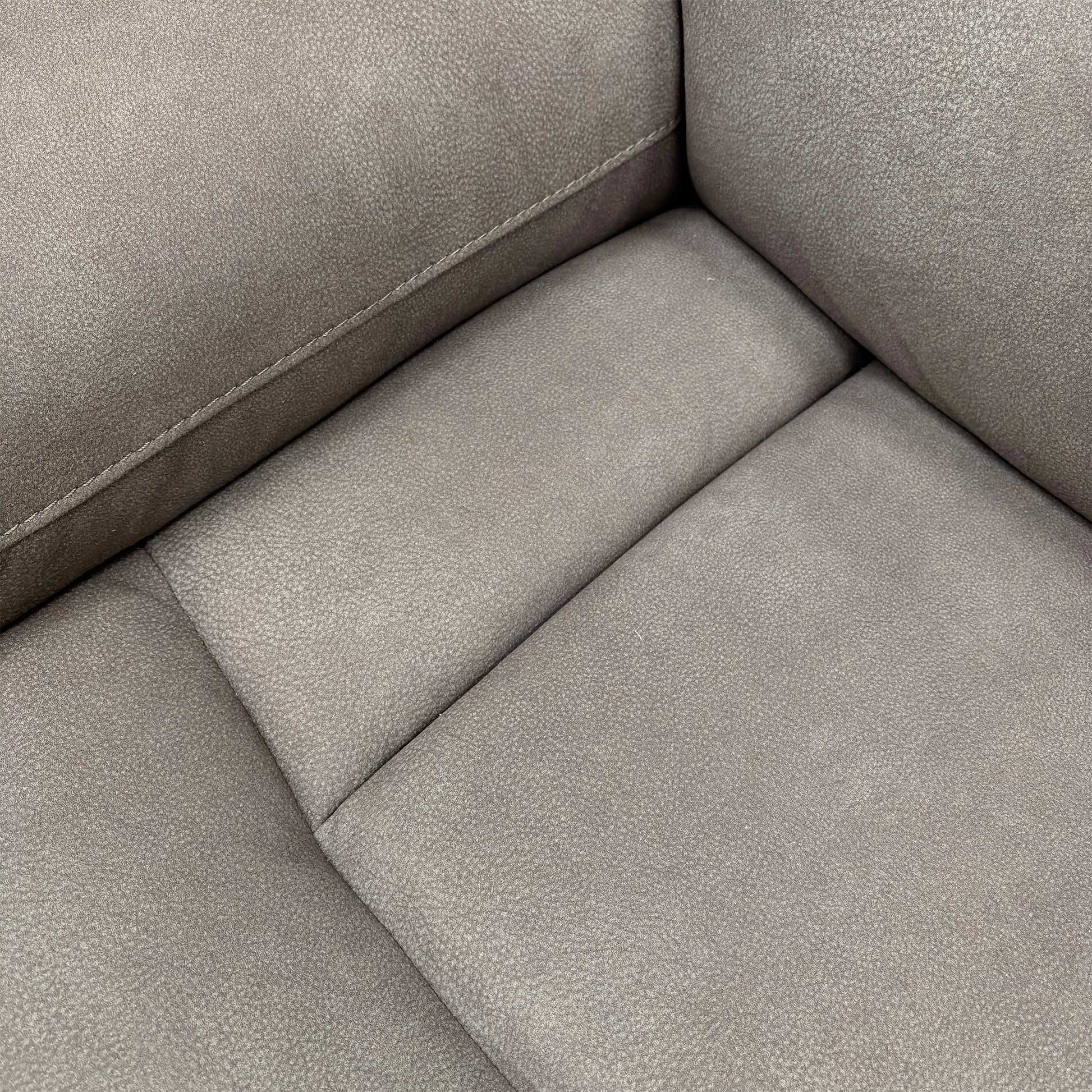 Detailed close-up of the Nappa Grey water-resistant fabric upholstery.