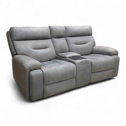 Side view of the Nappa Grey Fabric Sofa, emphasizing its modern design and supportive back structure.