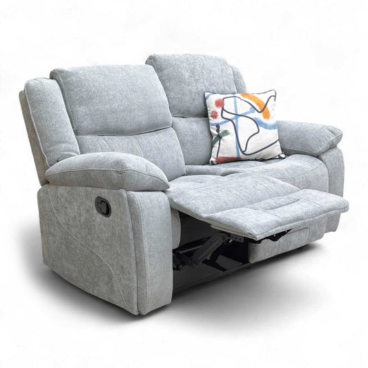 Angled view of the Weston 2 Seater Manual Recliner Sofa in Light Grey Fabric, showcasing its comfortable design and high back.