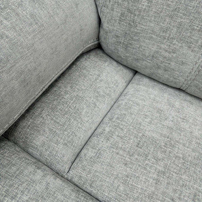 Detailed shot of the Light Grey Fabric upholstery and the plush, foam-filled seat cushion of the Weston chair.