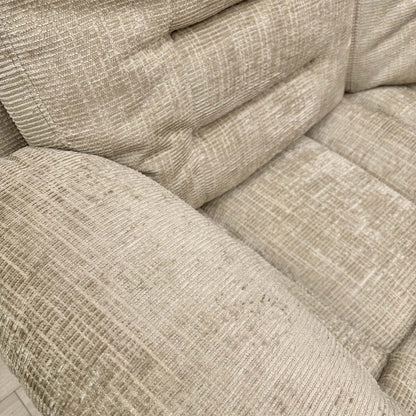 Close-up of the Latte fabric texture and stitching.