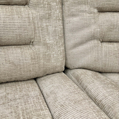 Close-up detail of the Latte colour upholstery fabric used on the Wilbur sofa, showing the soft texture.