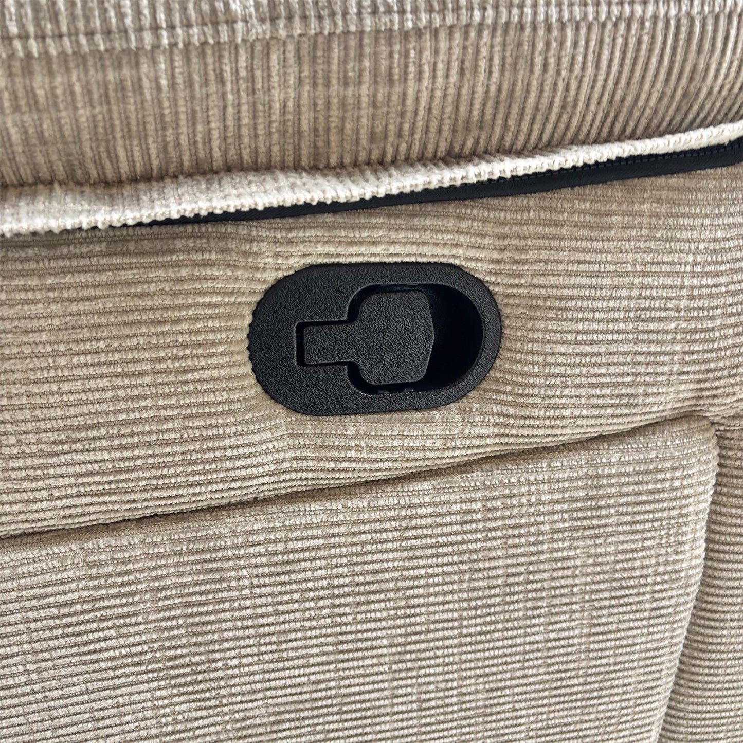 Detailed shot of the manual recliner mechanism lever located on the side of the sofa arm.