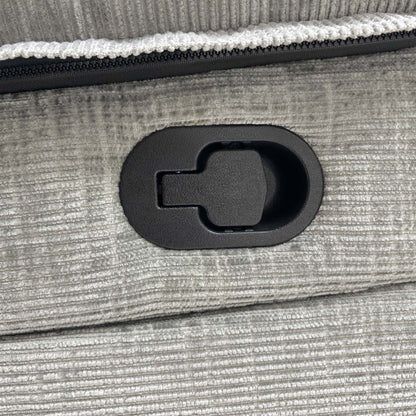 Detail shot of one of the manual recliner seats on the Wilbur sofa, extended for comfort.