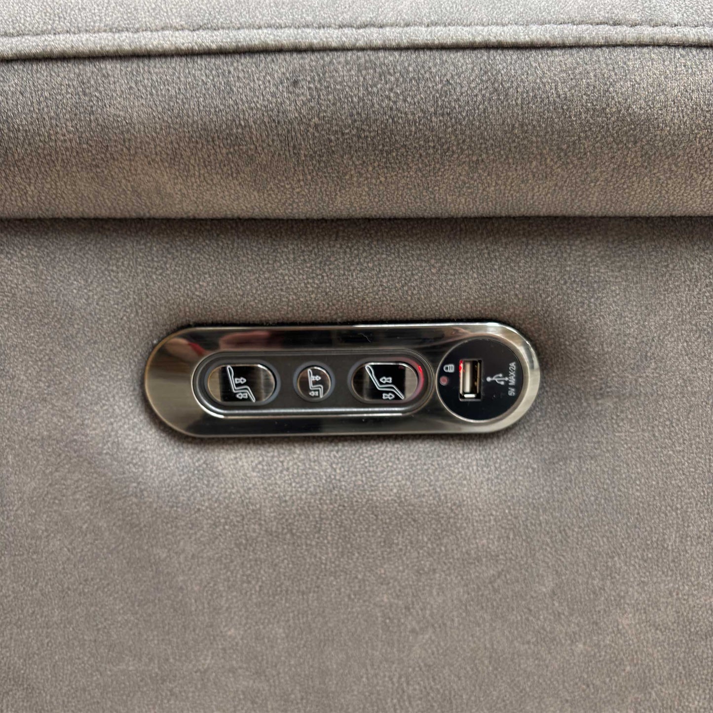Detail of the Power Recliner control buttons and built-in USB device charging feature.
