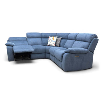 Angled view of the large blue corner sofa, likely with one recliner deployed.