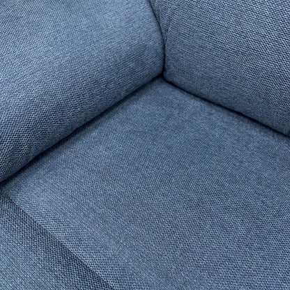 Close-up of the blue fabric and stitching details.