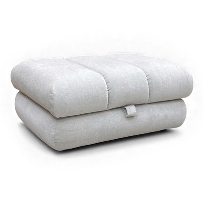 Angled view of the taupe storage footstool.