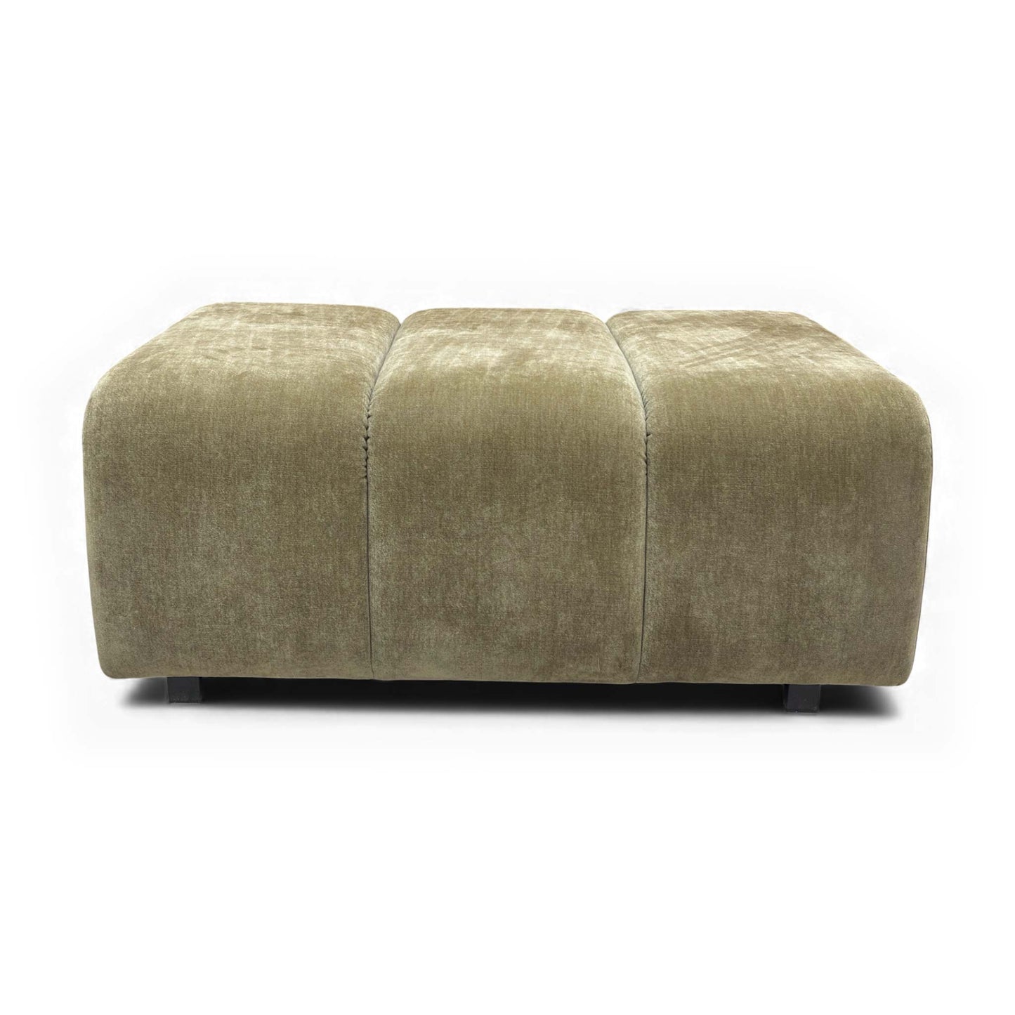 Another view of the footstool in a room setting for context.