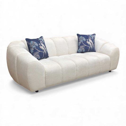 Angled view of the Sofology Waldorf 3 Seater Sofa in soft ivory white chenille fabric.