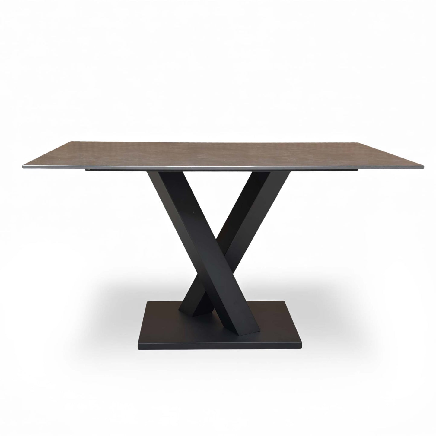 Close-up showing the matt-finished grey sintered stone tabletop texture and V-base connection.