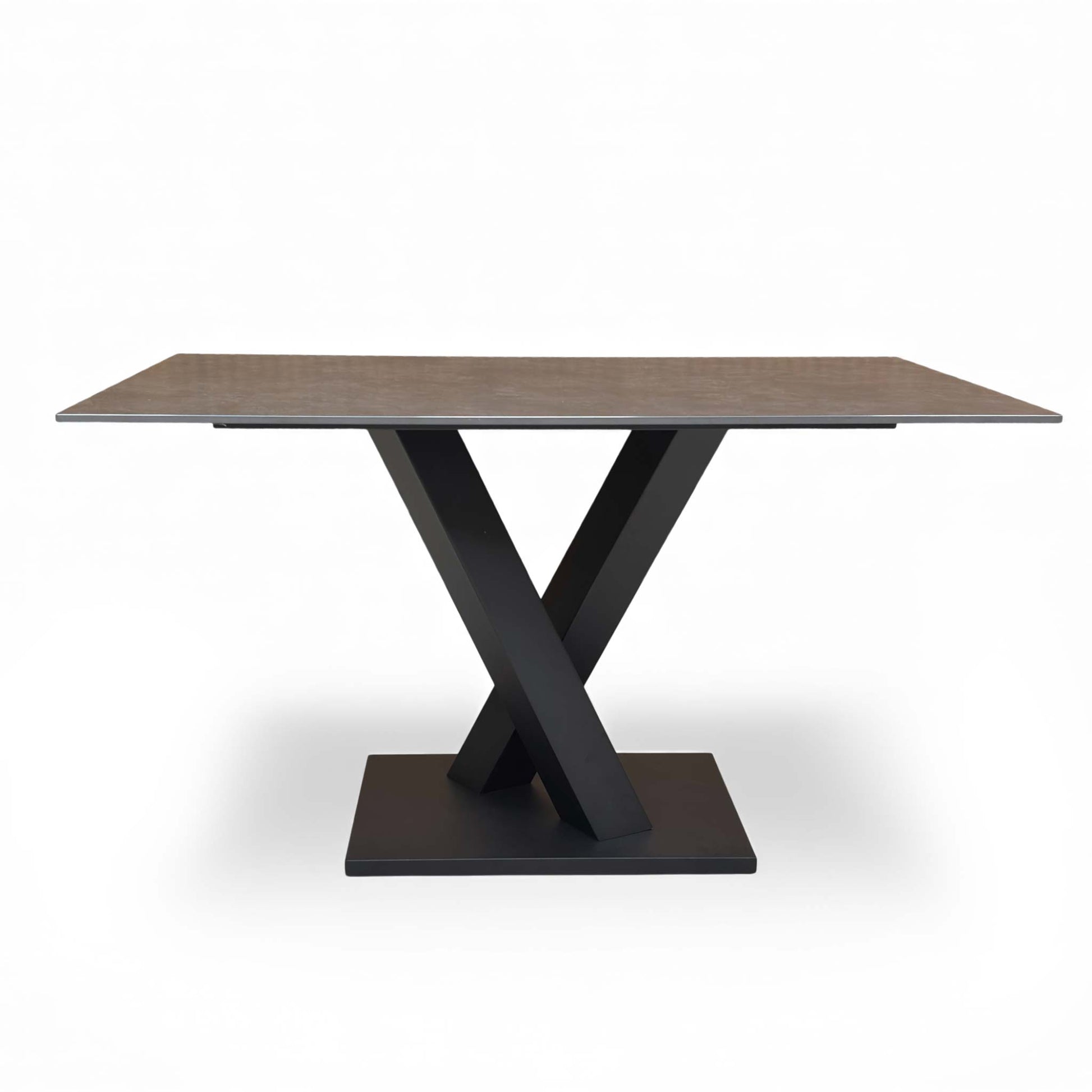 Close-up showing the matt-finished grey sintered stone tabletop texture and V-base connection.