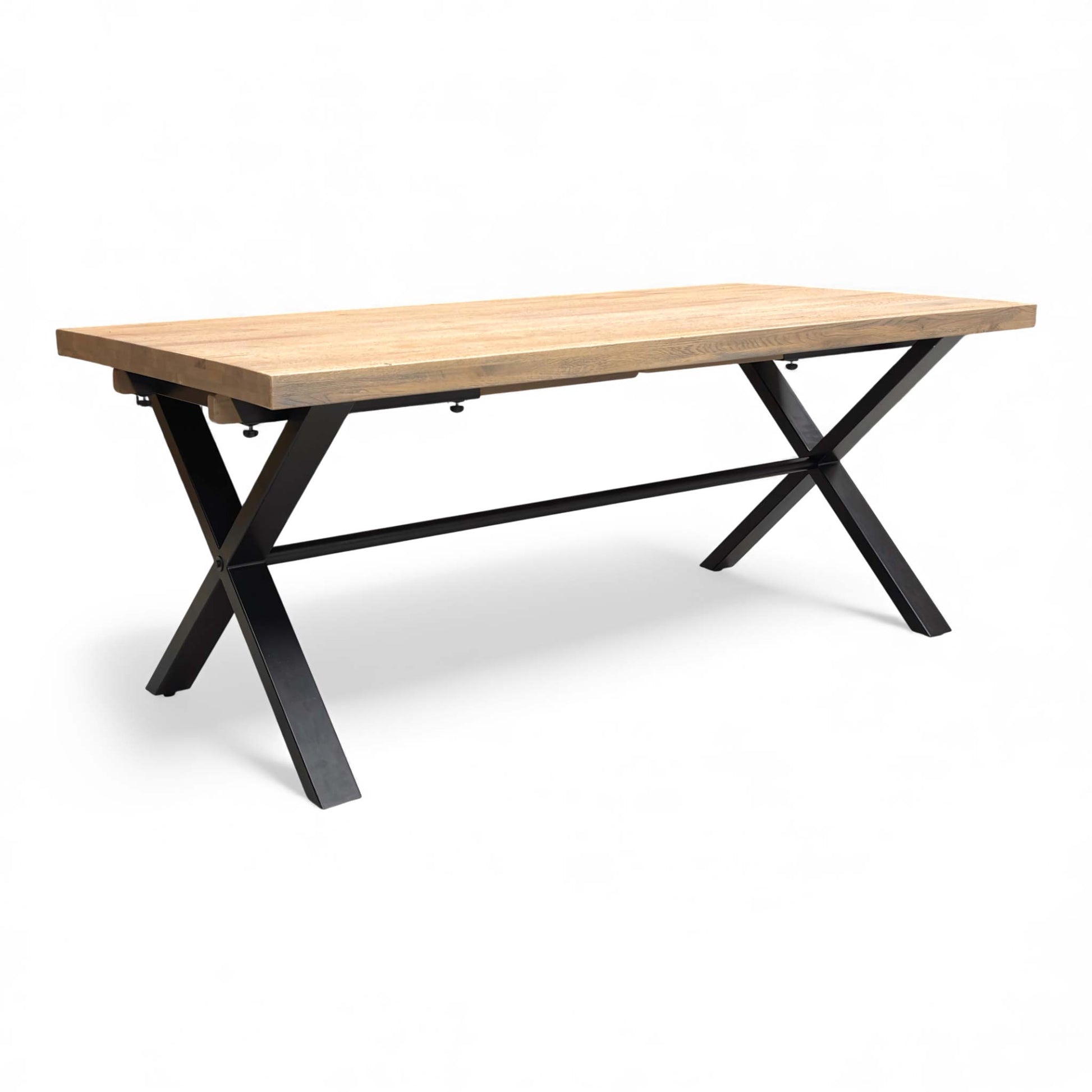 Angled view of the Saturn Solid Oak 190cm Fixed Dining Table with industrial Metal X-Shaped Legs.