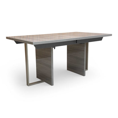 view showing the table's height and the modern silhouette of the acrylic leg supports.