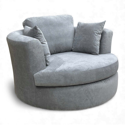 Angled view of the Freya Large Swivel Chair in Graphite Grey Plaza Linen fabric.