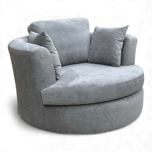 Angled view of the Freya Large Swivel Chair in Graphite Grey Plaza Linen fabric.