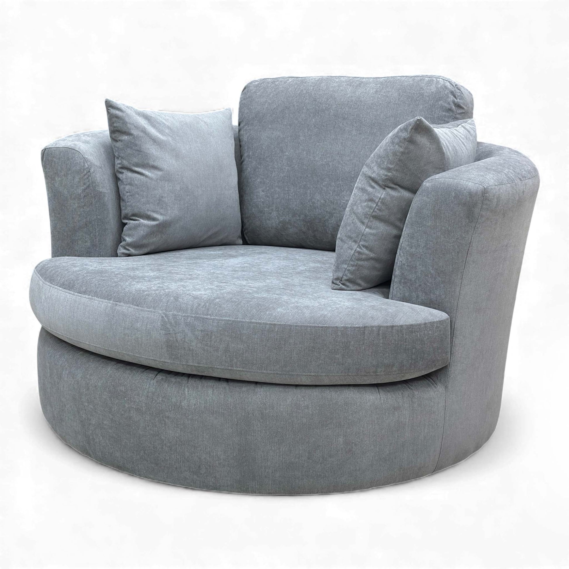 Side profile of the Freya Swivel Chair showing the round back design.