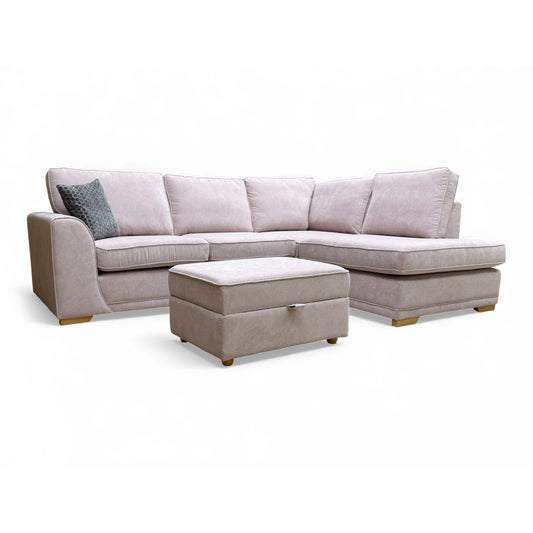 Angled view of the Orka Lilac Plaza Linen Left Hand Facing Corner Sofa with the included Large Storage Footstool.