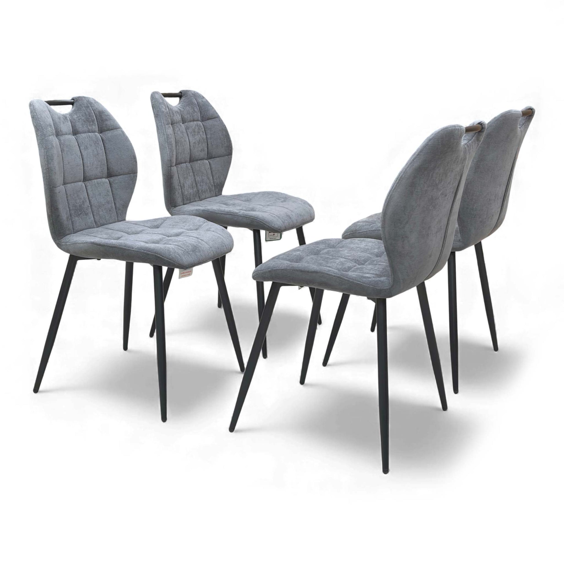 Angled view of the Alva Charcoal Grey Fabric Fixed Dining Chair, showcasing the padded seat.