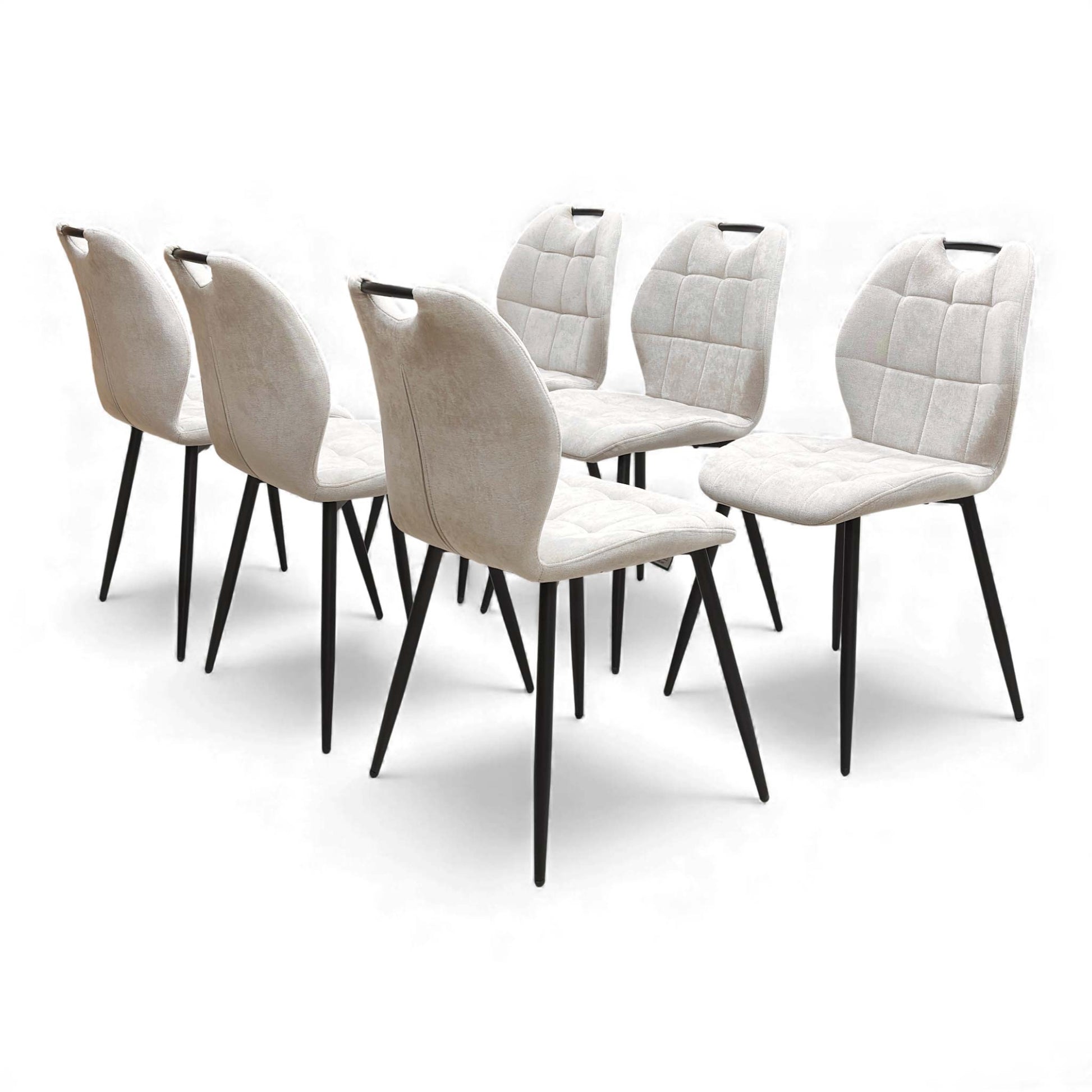 View of the backs of the Alva Beige Dining Chairs.