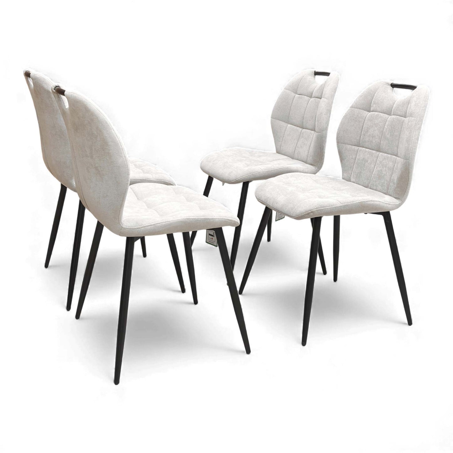 View of the backs of the Alva Beige Dining Chairs.