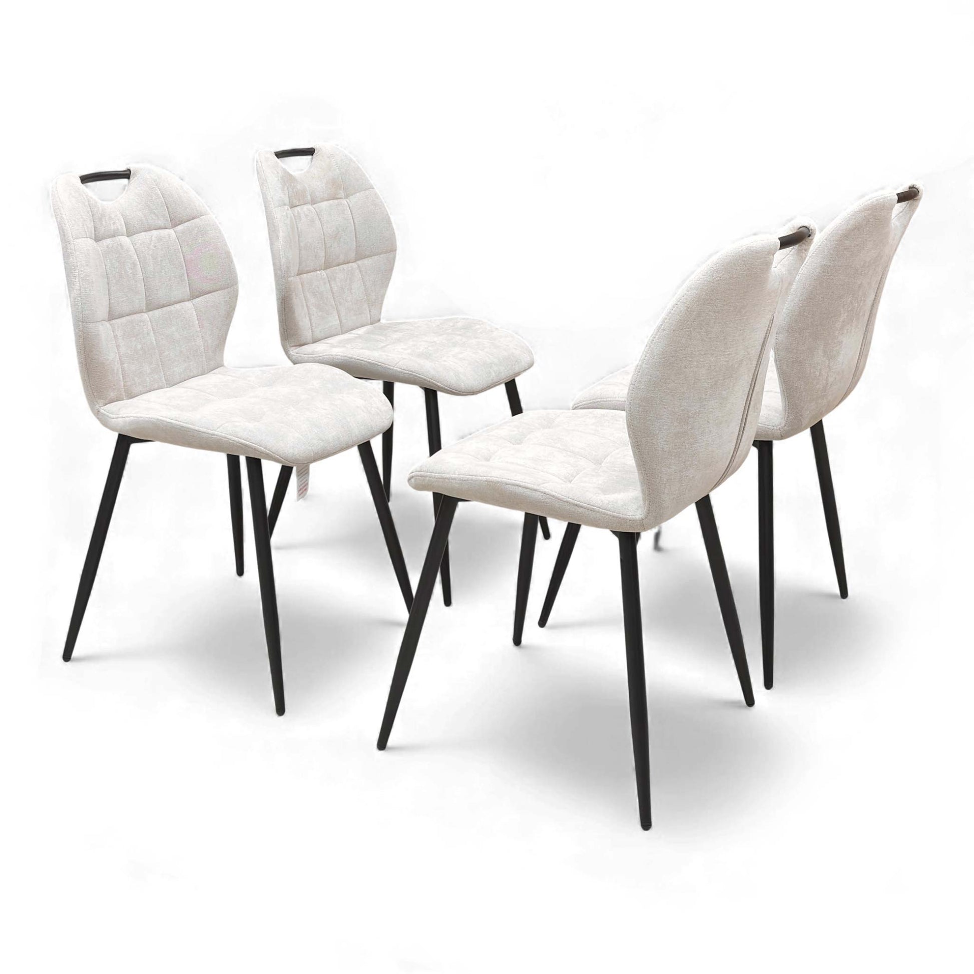 Angled view of the Alva Beige Fabric Fixed Dining Chair, showcasing the padded seat.