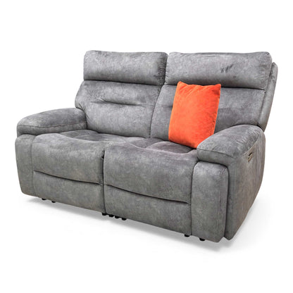 Angled view highlighting the body-hugging design and luxurious, fixed pocket spring seat cushions.