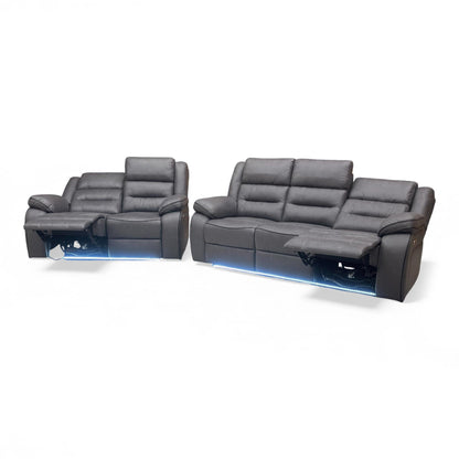 Side profile of the Vegas power recliner, emphasizing the streamlined design, comfortable armrests, and the fully extended reclining position.