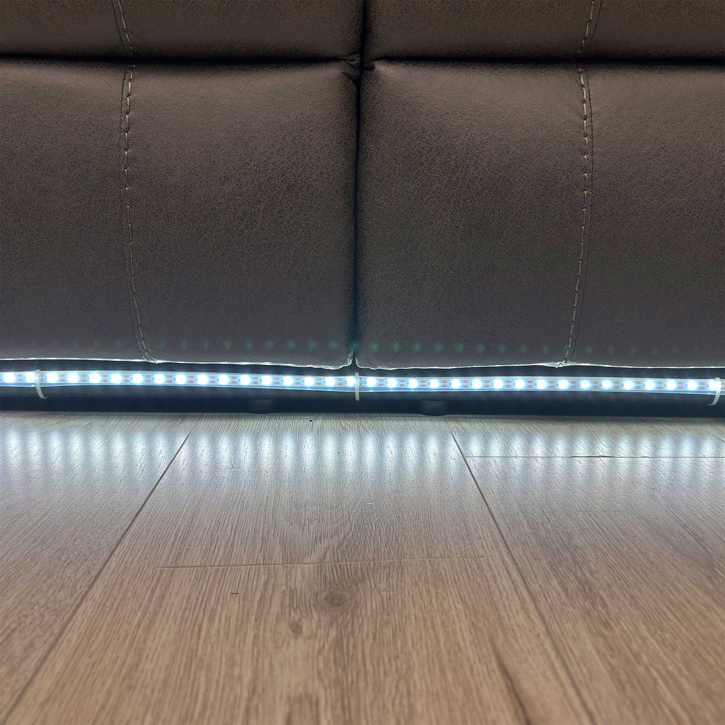 The Vegas 2-Seater Sofa at night, highlighting the integrated LED lighting feature.