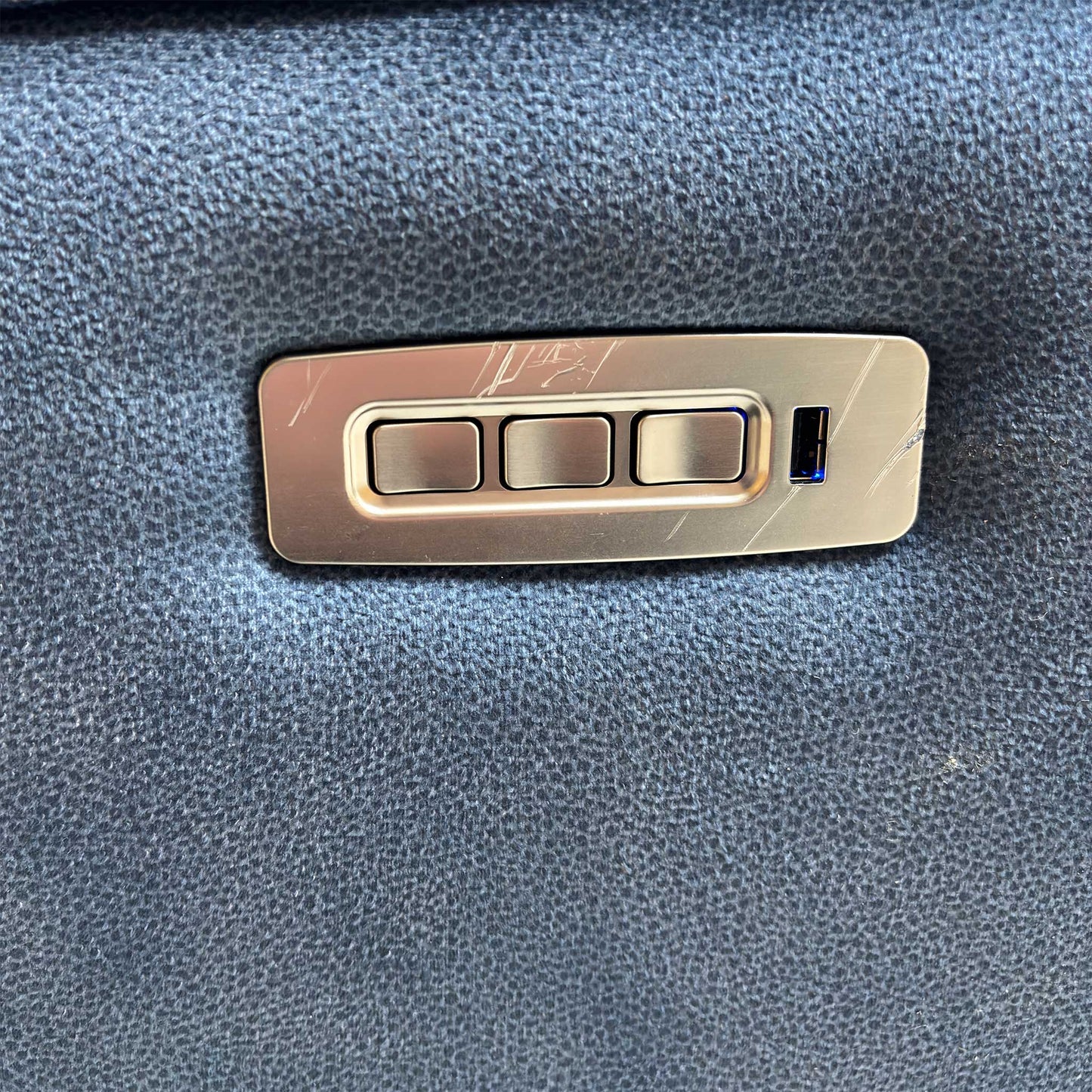 Detail shot of the power control buttons and integrated USB port.