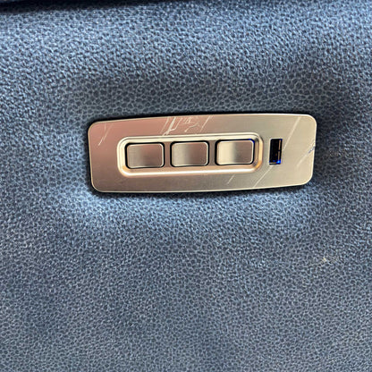 Detail shot of the power control buttons and integrated USB port.