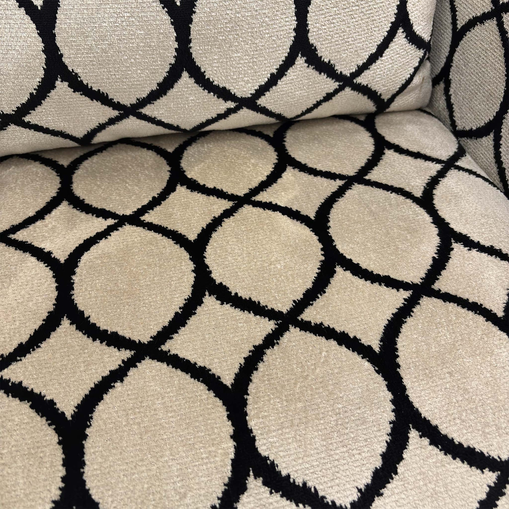 Close-up of the back and generous cushion of the 'Sumptuous' Natural Canto Accent Chair.