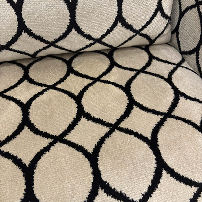 Close-up of the back and generous cushion of the 'Sumptuous' Natural Canto Accent Chair.