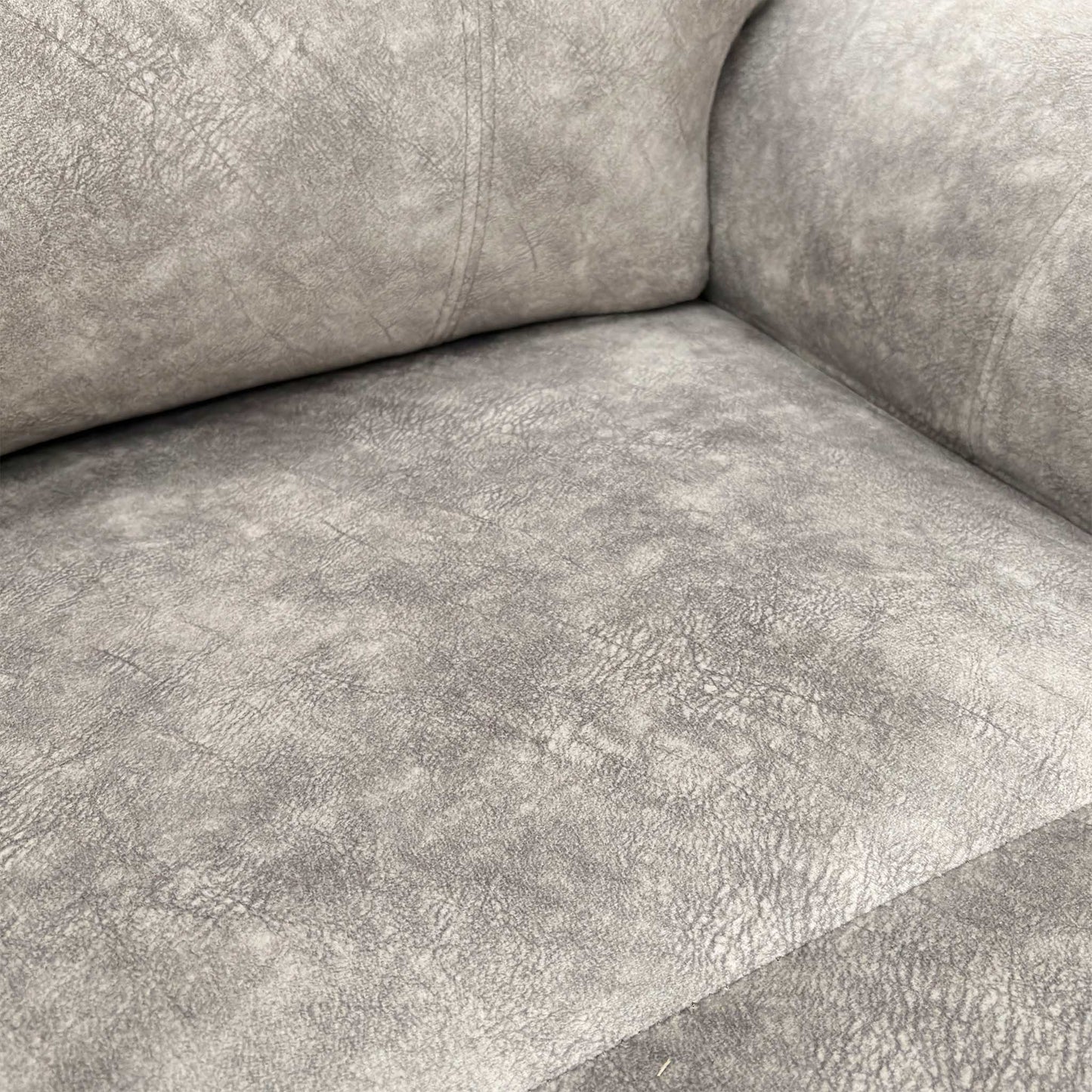 Close-up texture of the luxurious Marble Stone Grey Velvet upholstery.