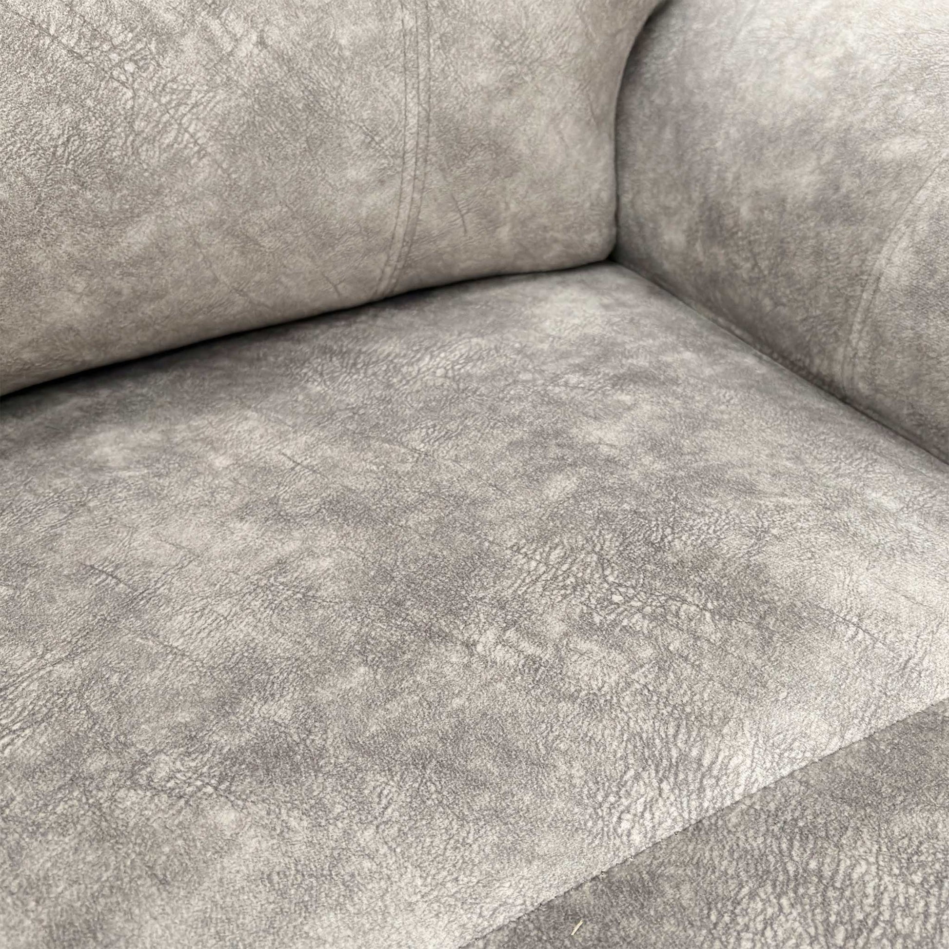 Close-up texture of the luxurious Marble Stone Grey Velvet upholstery.