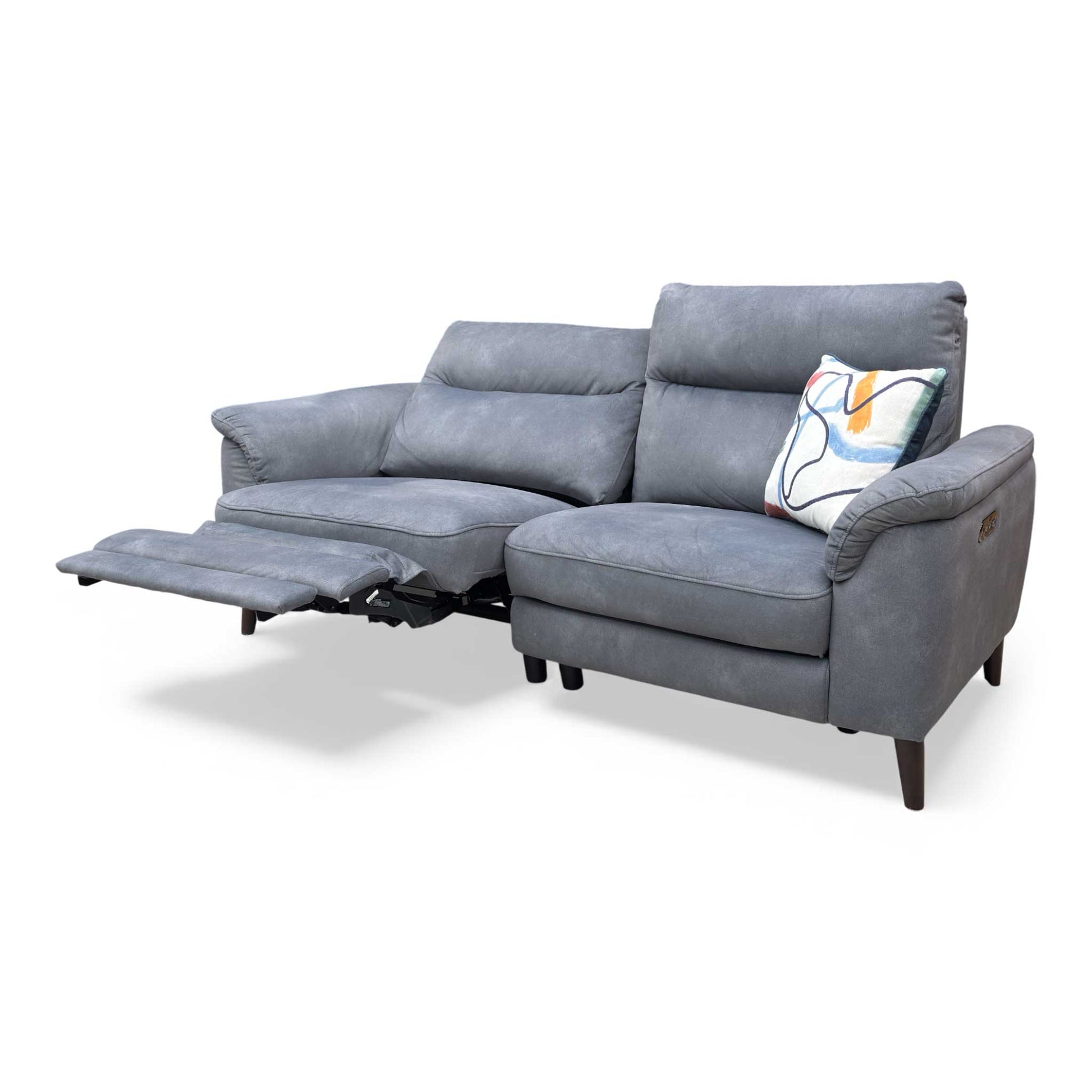 View of the sofa from the side, emphasizing its depth and mid-century profile.