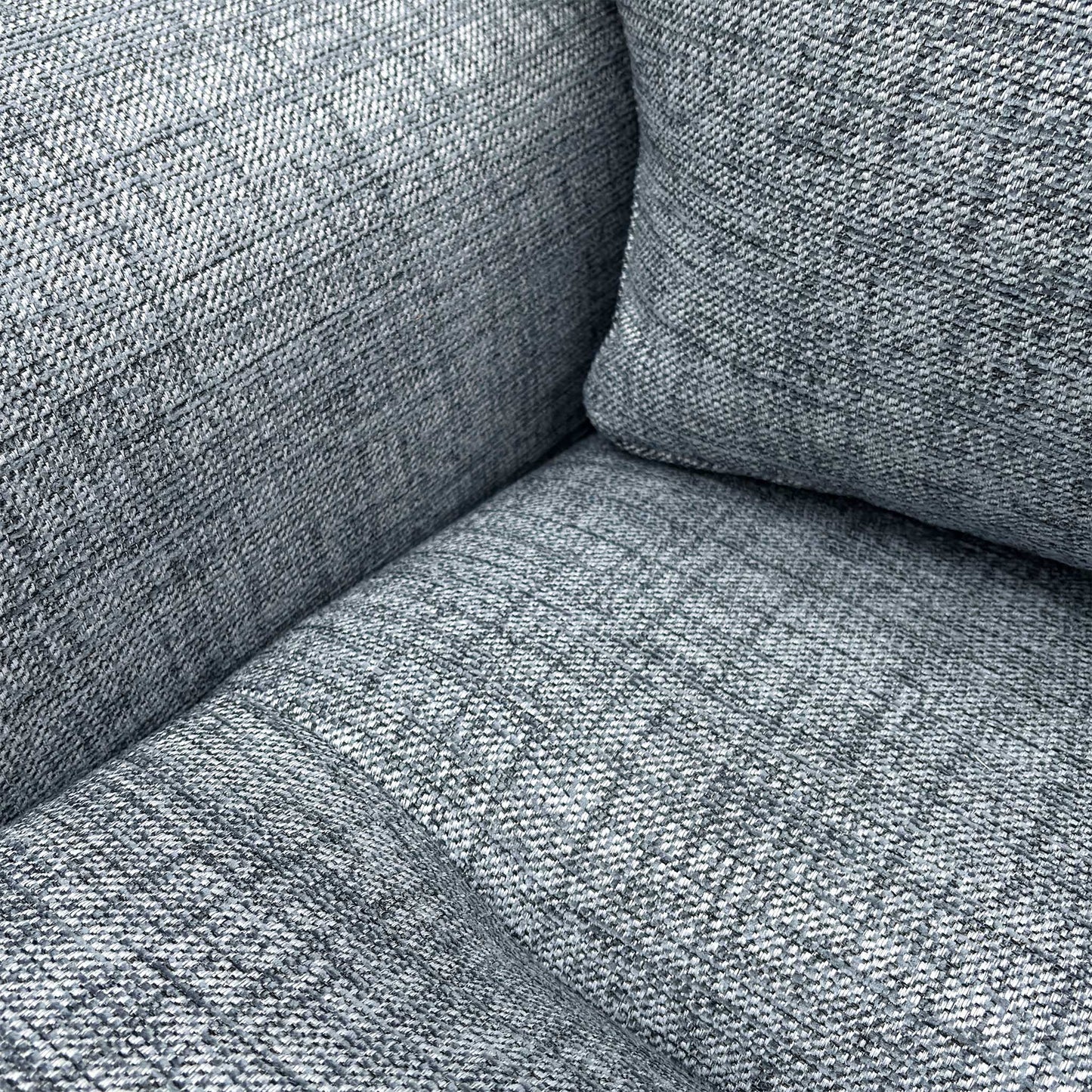 Close-up of the back and sumptuous cushions of the Hudson Woven Fabric Sofa.