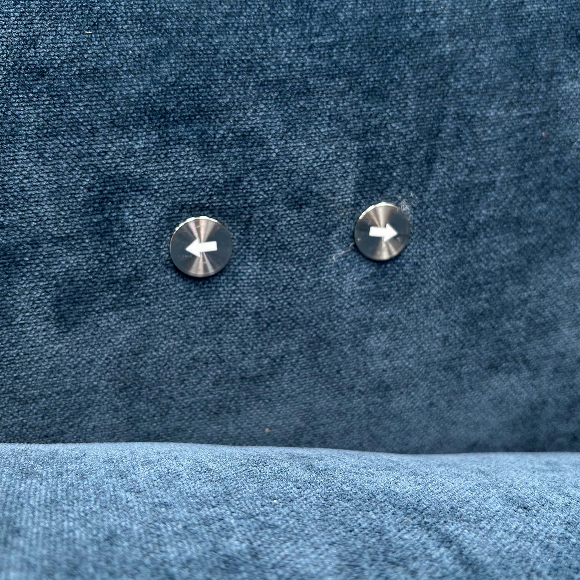 Close-up of the power recliner buttons.