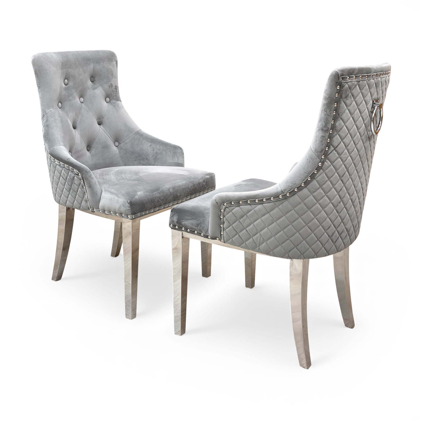 Two Silver Velvet 'Dolce' Dining Chairs shown together in a room setting.