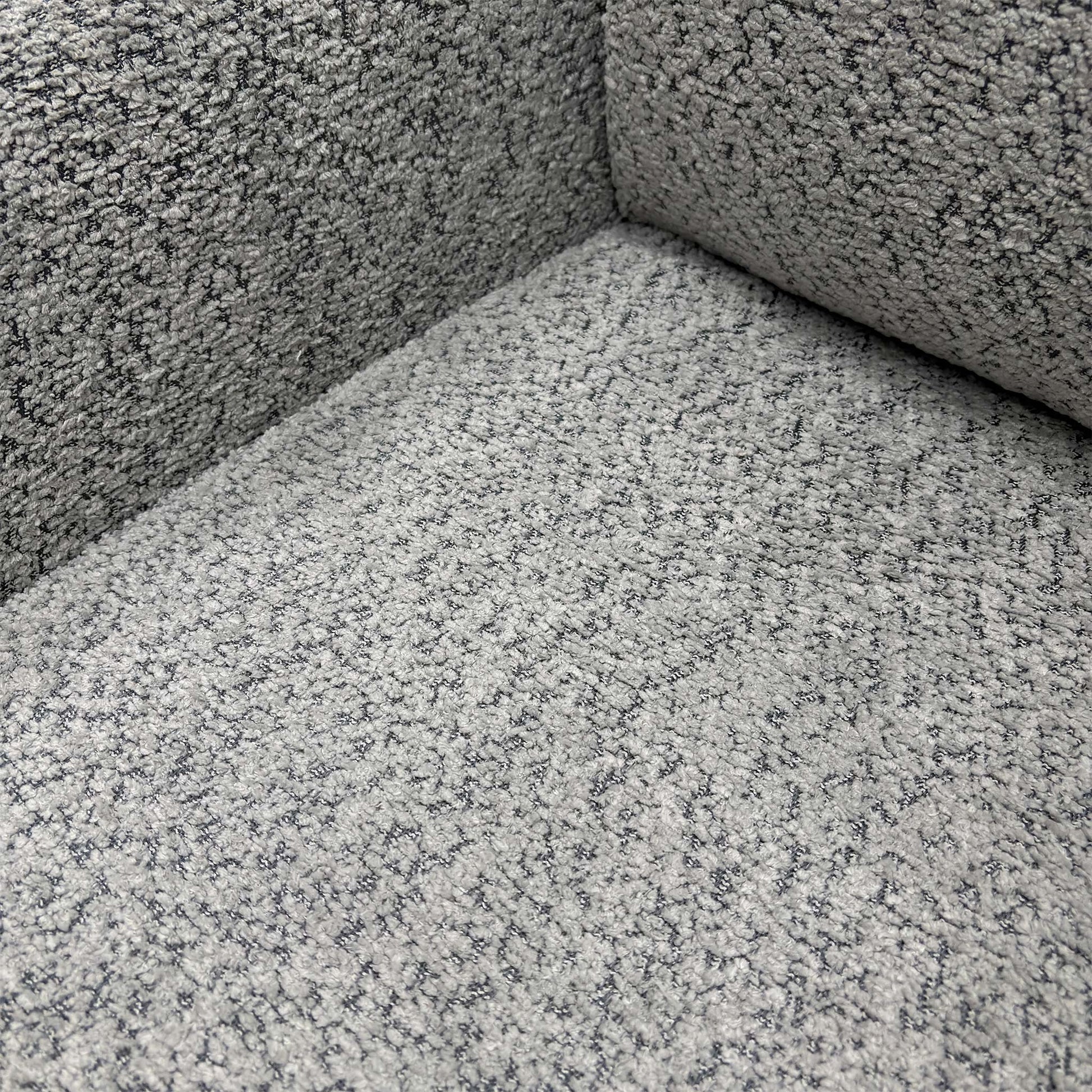 Detail shot of the metal base, emphasizing the modern design and swivel mechanism.