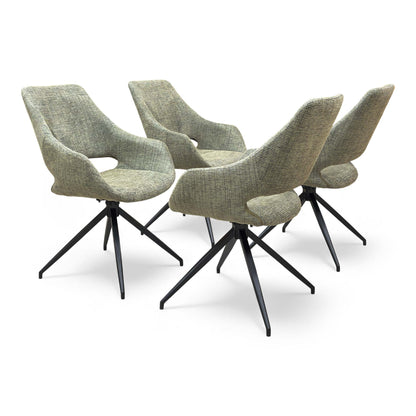 The ‘Charlotte’ Swivel Dining Chair in Sage Green Tweed, showcasing the bucket seat design and black star base.